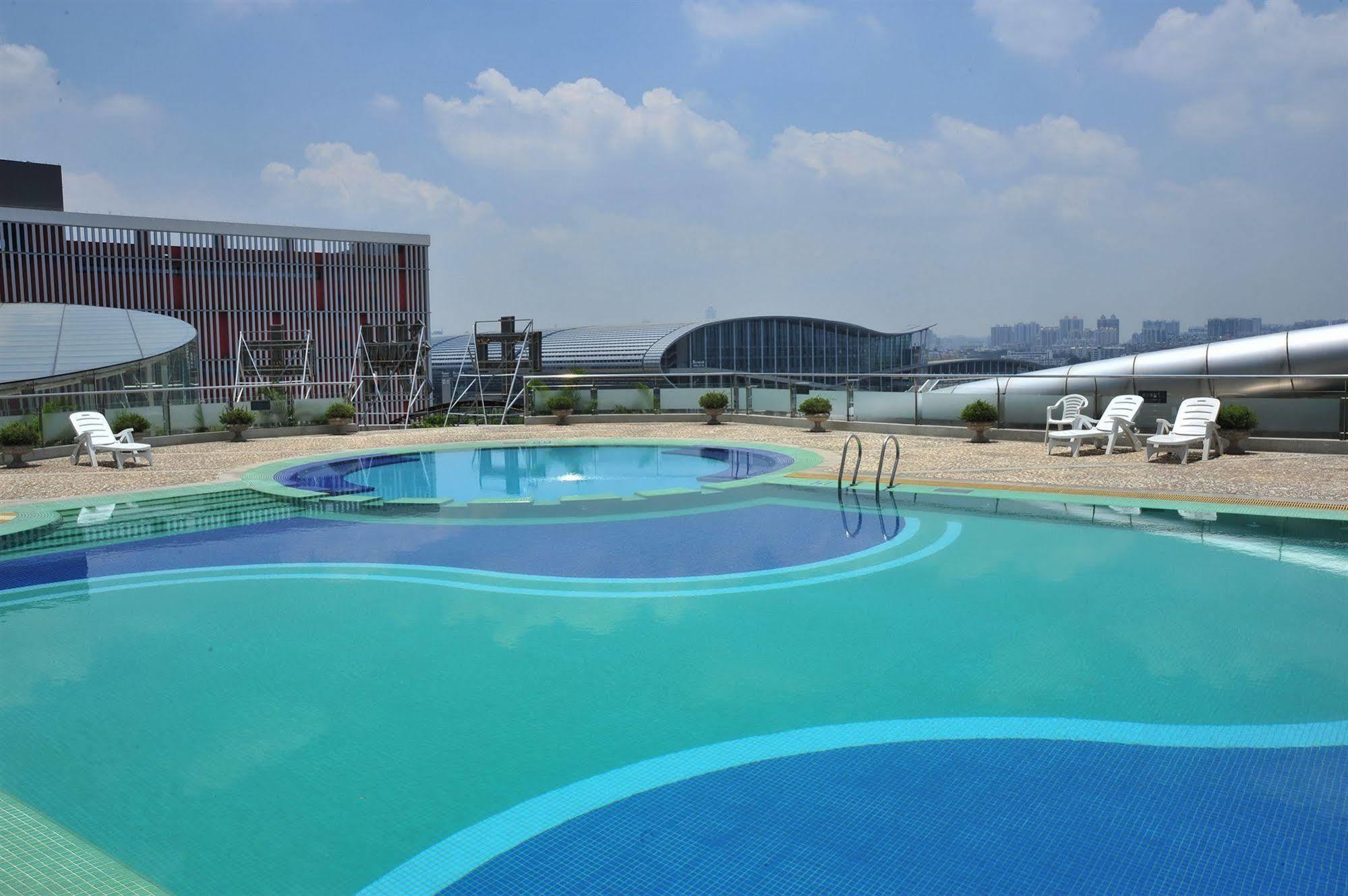 Yi-Wu Commatel Hotel Cantão Exterior foto