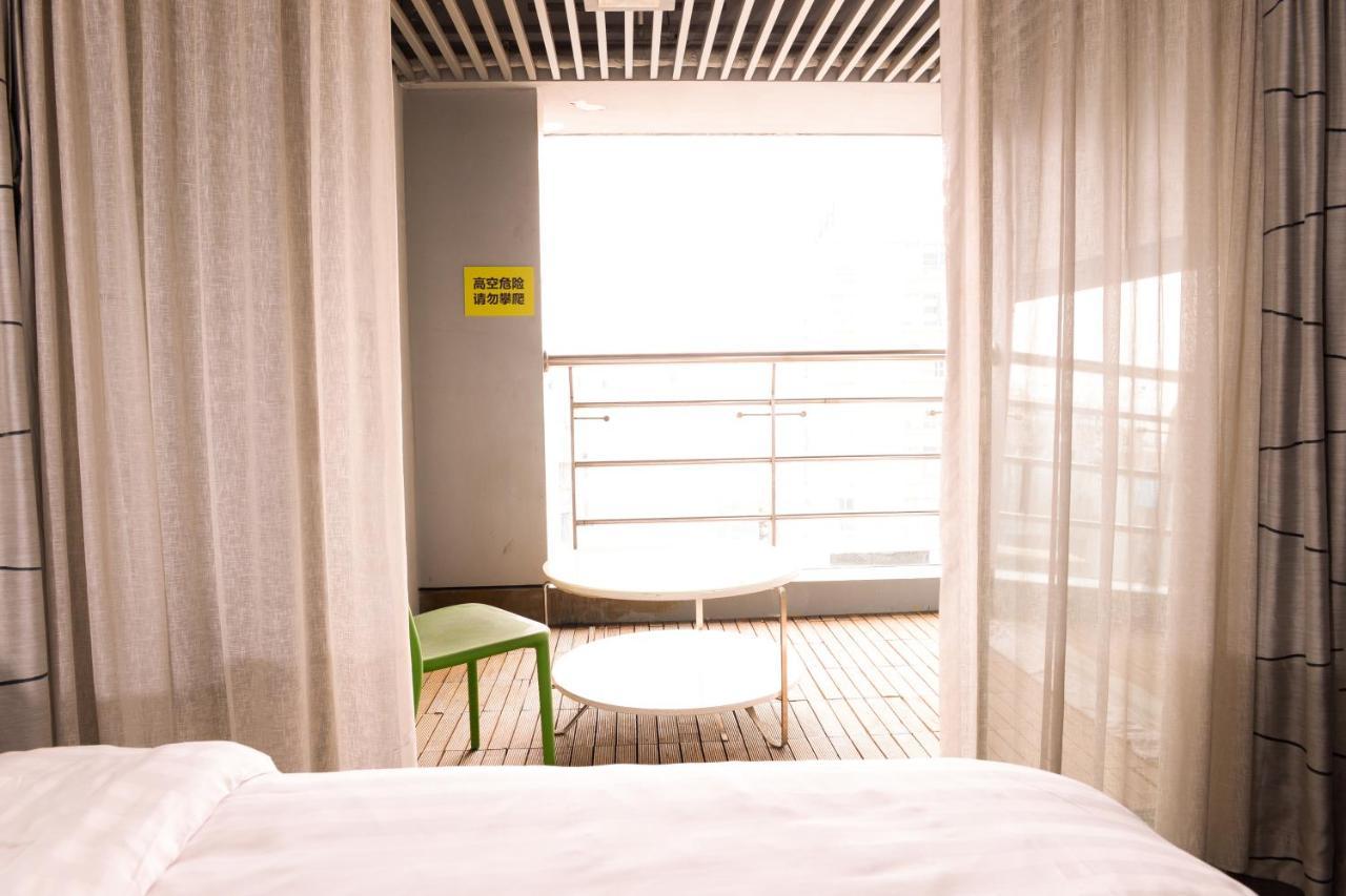 Yi-Wu Commatel Hotel Cantão Exterior foto